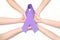 People holding purple awareness ribbon on white background