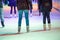 People ice skating at night in Vienna, Austria. Winter.