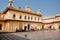 People inside courtyard of the hindu temple