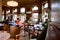 People inside the old cafe with historical interior