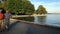 People jogging beside lake at Stanley park