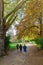 People are jogging in the Park Buttes-Chaumont in Paris, France