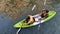 People kayak on a Bangkok canal