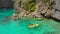 People kayaking at the twin lagoon in Coron, Palawan