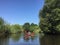 People kayaking on Wieprza river Poland