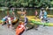 People with kayaks on the river Semois near Bouillon, Belgium
