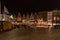 People on the large Market Square Markt in the centre of Bruges, night scene