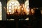 People light candles during festive prayer in church during holidays