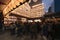 People line up to enter the Tori-no-Ichi Fair decorated at night with luminous paper lanterns.