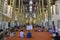 People listen to buddhist monk prayer in asian temple