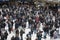 People at Liverpool Street station. Opened in 1874 it is third busiest and one of the main railway stations in UK, with connection