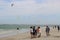 People look at Kite Surfers on the main beach of Langebaan, South Africa.