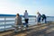 People looking at the view on San Clemente Pier.