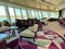 People in the lounge for suite level on the Royal Caribbean Mariner of the Seas in Port Canaveral, Florida