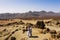 People in love kiss in the crater of the Teide volcano. Desert landscape in Tenerife. Teide National Park. Desert crater