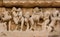 People in love scene in stone relief of ancient India. Khajuraho temple with sexual motif artworks, India.