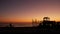 People making bbq campfire. Beachfront recreation area for barbeque with fire place. California USA