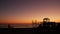 People making bbq campfire. Beachfront recreation area for barbeque with fire place. California USA.