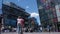 People with masks queue for health check in Sanlitun shopping area