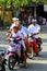 People on the motorbike on the road in Ubud. Landscapes of Indonesia.