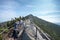 People on the narrow path to the summit of Whiteface