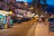 People near gift shops in Giardini Naxos in night