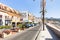 People near shops on waterfront in Giardini Naxos