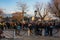 People observe Alhambra palace from Mirador San Nicolas viewpoint in Granada, Spain