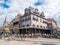 People and old weigh house now restaurant on Roode Steen square in downtown Hoorn, Netherlands