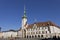 People at Olomouc city\'s Upper square and the Olomouc Town Hall with the Astronomical clock