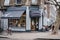 People at outdoor tables of Anthony Delicatessen cafe in Primrose Hill, London, UK