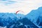 People paragliding on parachute in sky Penken Park Austria