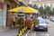 People and parked cars on the Skadarlija - Skadarska street in Belgrade, Serbia.