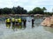 People particpating in a dolphin encounter at Discovery Cove Seworld