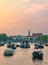 People Partying on Boat Along Amsterdam Canals during Sunset