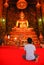 People pay homage, Wat Suthat Thepwararam, Beautiful temple architecture , Bangkok, Thailand