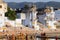 People perform puja - ritual ceremony helds every morning and evening at holy lake in Pushkar,India