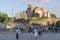 People photograph the sights of Rome against the background of the Temple of Venus and Roma