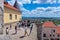 People are photographed on the vast ancient observation platform of the castle with a view of the whole city