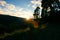 People photographing the sunrise over a mountain view in the Yarra Ranges, Victoria Australia