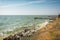 People on the pier along the Afsluitdijk in the IJsselmeer in th