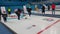 People play in curling for recreation purpose in ice arena during winter season
