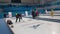 People play in curling for recreation purpose in ice arena during winter season