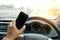 People play smart phones while driving tha car,road\'s raining u