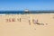 People play volleyball and train at the beach