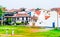 People playing crickert in front of cityscape of colonial old town of Galle, Sri Lanka