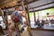 People playing the Pony rides on a merry-go-round carousel.