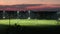 People playing soccer game on illuminated public stadium at night. Active way of life concept