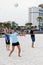 People playing volleyball on the beach in Pensacola,Florida USA