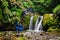 People practicing canyoning in the Natural Park of Ribeira dos Caldeiroes in Azores